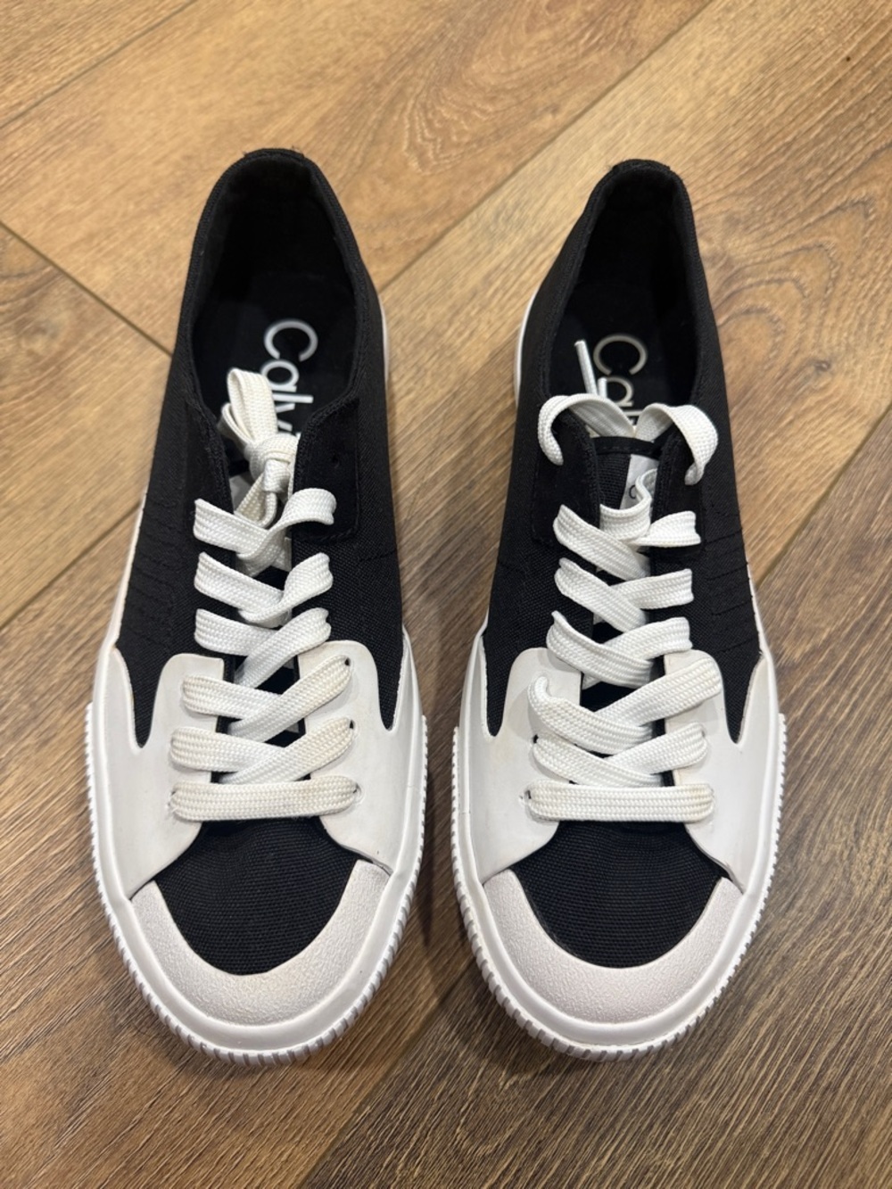 Calvin Klein Black and White Low-Top Slip-On Sneakers. Size 9